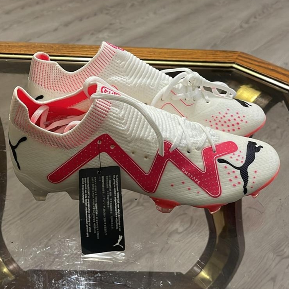 Puma White and Pink Athletic Cleats
